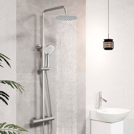 Sistema doccia AICA con miscelatore termostatico e soffione in acciaio inox da 20 cm di diametro, regolabile in altezza, color cromo.